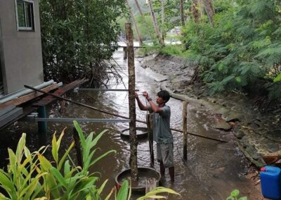 Building the posts in the water for the Local Divers shop.