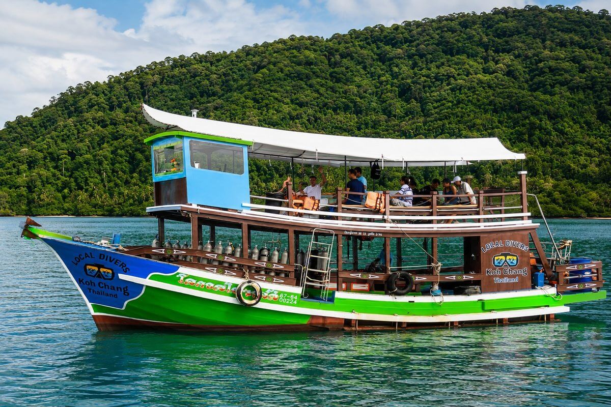 Local Divers two-story dive boat on the water at Koh Chang
