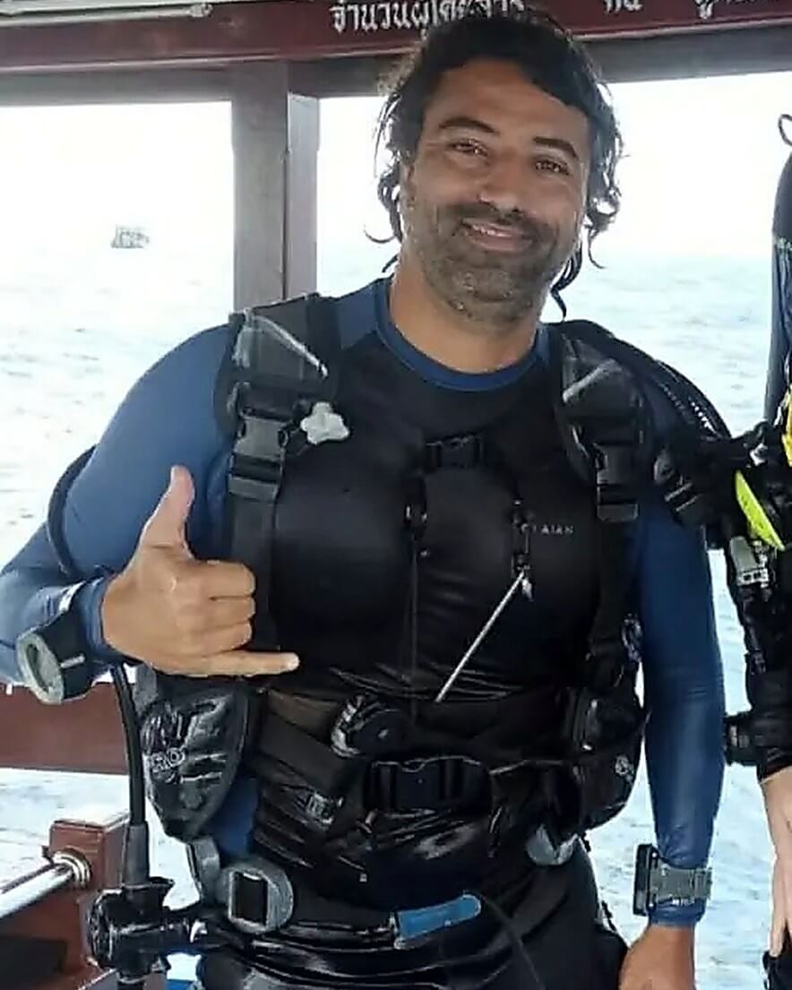 Karim, PADI Dive Instructor, on the Local Divers boat