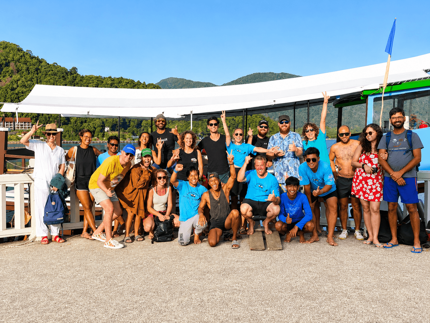 The Local Divers team and guests together on the pier at Bang Bao, Koh Chang